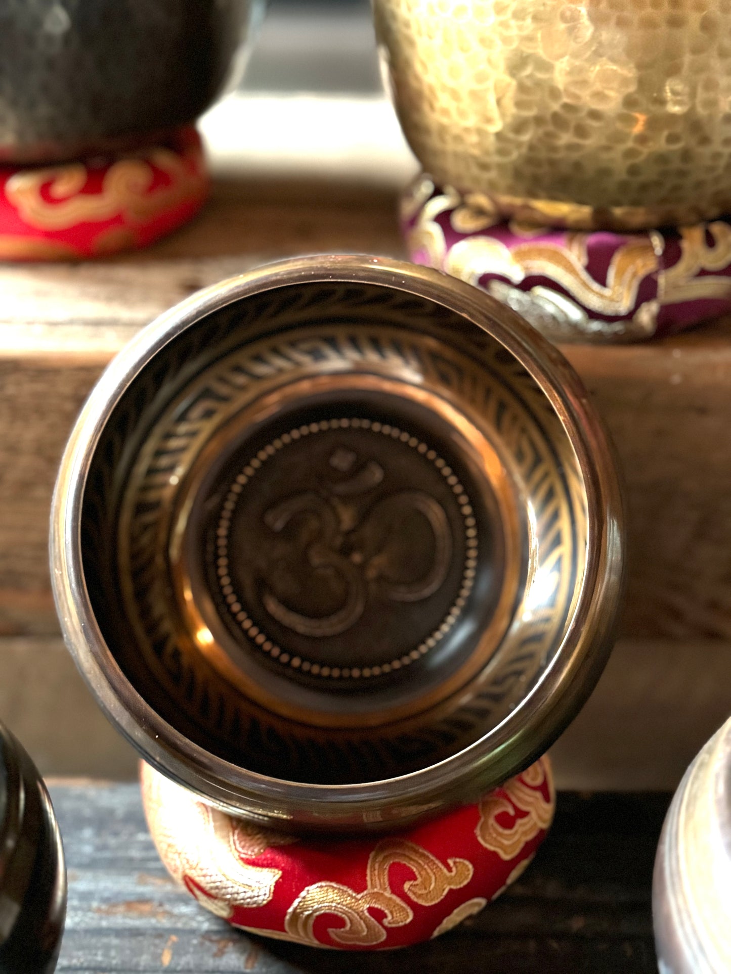 Tibetan Singing Bowl etched Om Mani Padme Hum symbols, carved on the inside